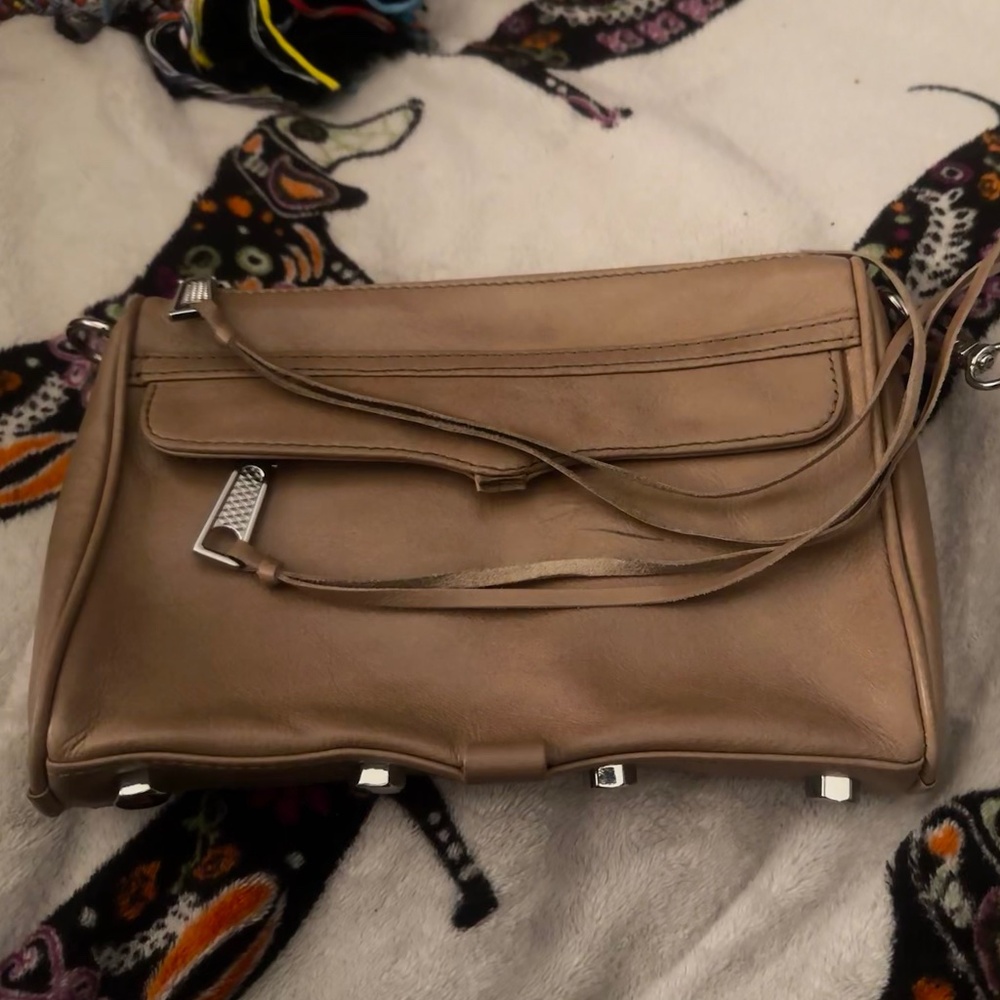 Rebecca Minkoff, Real  leather tanned colored, wristlet, leather fringe